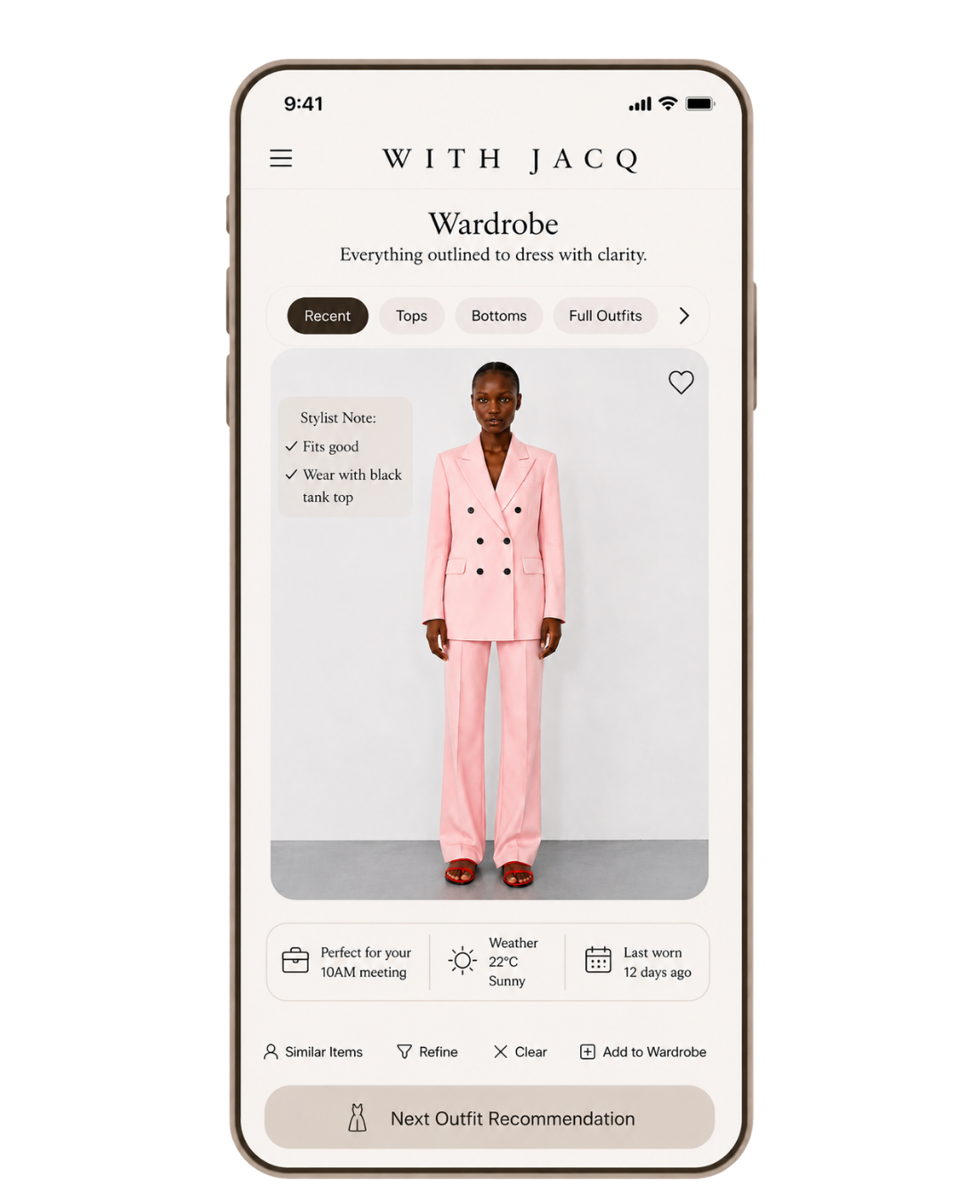 With Jacq AI personal styling app — model in pink suit using AI-powered virtual try-on feature on iPhone