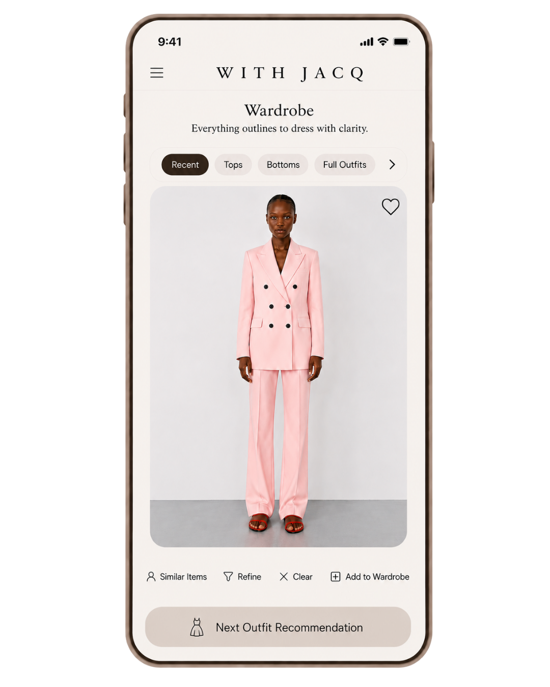 With Jacq AI personal styling app — model in pink tailored suit, demonstrating AI-powered outfit recommendations and virtual try-on for women
